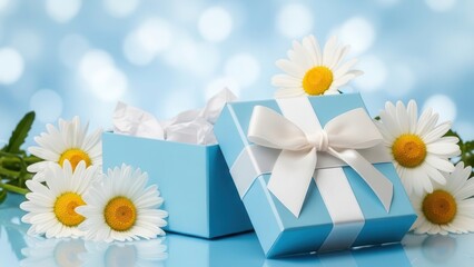 Obraz premium Blue gift box with white bow and daisies