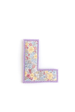 Fabric letter L with colorful floral pattern