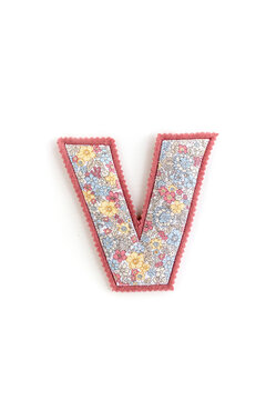 Fabric letter V with colorful floral pattern