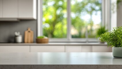 Bright, airy kitchen counter with a window overlooking lush green foliage