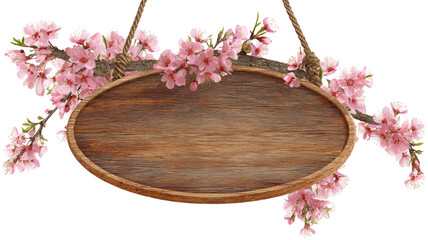 An empty round wooden cutting board frame decorated with spring blossom flowers on a natural brown wood kitchen table texture