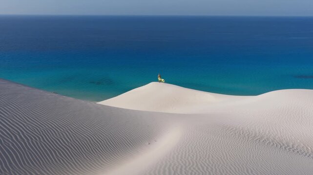 Aerial View of White Sand Dunes and a Large Rock Formation on Socotra Island, Yemen