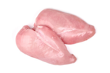 Two fresh raw boneless, skinless turkey breasts, pale pink, for healthy cooking concepts, isolated...