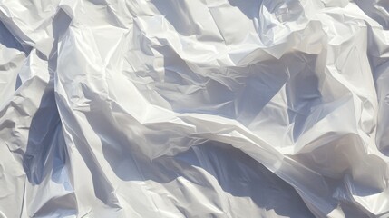 Obraz premium A Close Up Abstract Texture of White Plastic Sheeting With Folds and Shadows