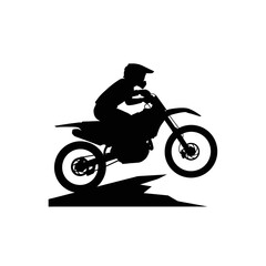 Obraz premium Dynamic motocross rider performing a jump