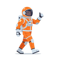 Fototapeta premium Astronaut giving thumbs up, walking in orange space suit, isolated on white background