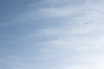 Security helicopters fly in formation over Davos, Switzerland, during heightened security measures associated with the World Economic Forum.