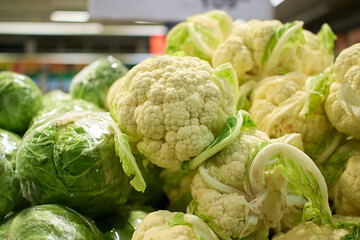 Exploring fresh vegetables at a local market during the morning hours in vibrant city life