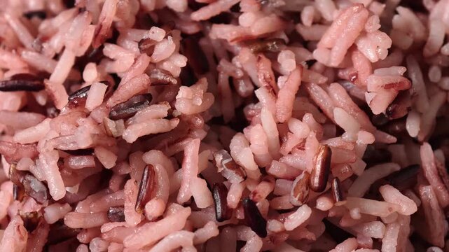 Wooden bowl filled with riceberry 