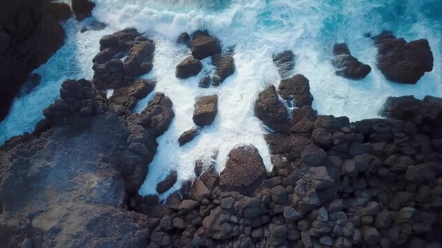 Powerful Ocean Waves Crashing on Rocky Coastline