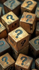 Obraz premium Symbolic wooden cubes with question marks represent uncertainty and the search for solutions in the modern world, ideal for creating an atmospheric backdrop for presentations on strategic planning.