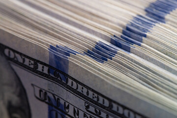 Blue Security Ribbon On Dollar Stack