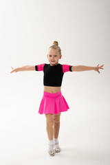 Young dancer with cochlear implant performing expressive sport dance movement. Hearing loss rehabilitation, auditory therapy, assistive technology, physical coordination, and confidence growth