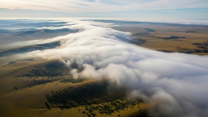 Obraz premium Misty Morning Over Rolling Hills