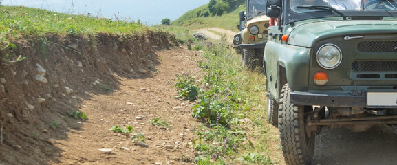 Off road car in a mountain road.