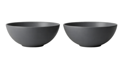 Two identical minimalist dark gray ceramic stoneware serving bowls displayed side by side with a modern matte finish, isolated on transparent background
