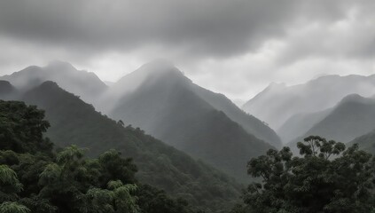 Misty mountains shrouded in clouds, dark and dramatic