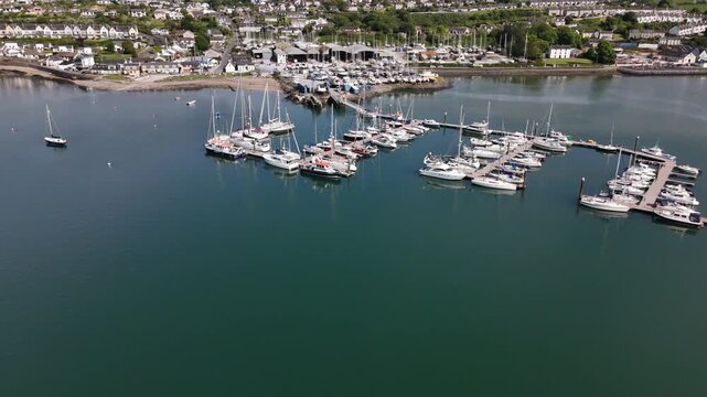 Dazzling boats anchored in the serene Kinsale harbour of Ireland