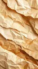 A detailed close-up of deeply crumpled and torn light brown parchment paper texture.