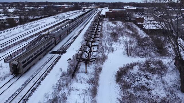 Train station in Rochester, NY with train at station Louise M. Slaughter Station in Winter with snow