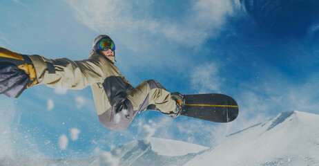 Snowboarder in action. Extreme winter sports.