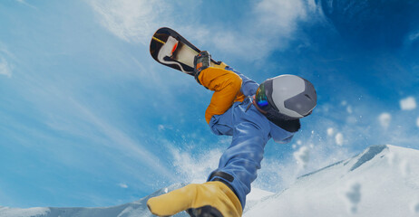 Snowboarder in action. Extreme winter sports.