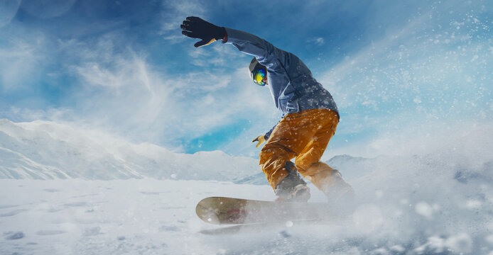 Snowboarder in action. Extreme winter sports.