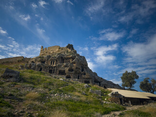 Fototapeta premium Ancient Rock-Cut Tombs on Mountain in Lycian city of Tlos 