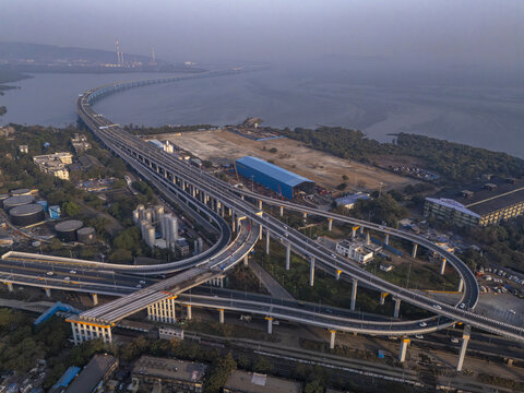 Aerial view of the expansive Shri Atal Bihari Vajpayee Trans Harbour Link gracefully curving over the waters, Mumbai, Maharashtra, India.