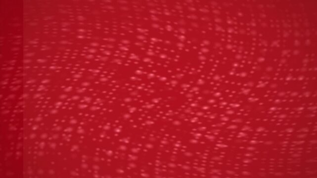Crimson Texture: A close-up showcases a vibrant red surface. This captivating macro reveals a textured background, highlighting the subtle interplay of light and shadow, perfect for design.