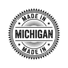 Obraz premium a vintage circular badge design proudly declaring products made in michigan state