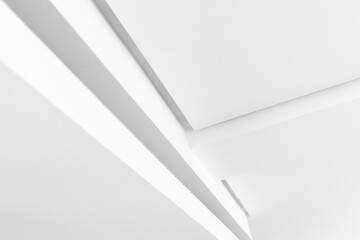 Monochrome abstract photo featuring clean white planes