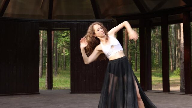 Fluid dance showcasing dramatic poses and sweeping gestures