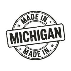 Fototapeta premium a vintage style badge or stamp graphic proudly displaying made in michigan
