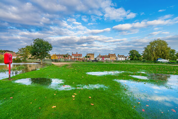Obraz premium Flooded recreation park overlooking Godmanchester village. Cambridgeshire. UK