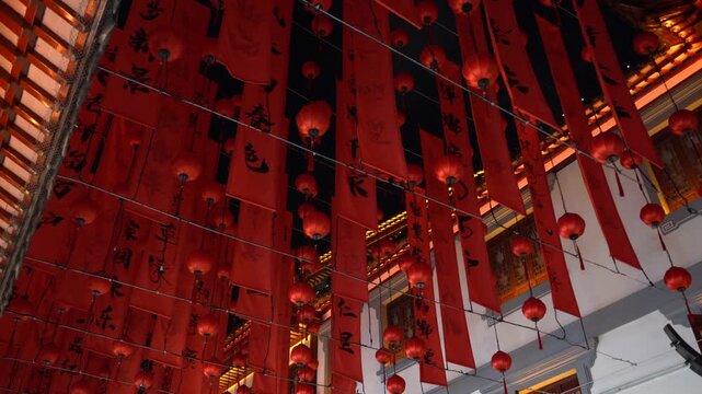 Traditional Chinese Street Decorated with Red Flags and Lanterns for Chinese New Year, Festive Atmosphere, Travel and Cultural Concept