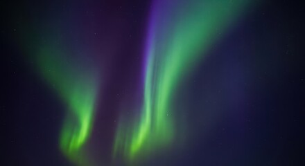 Gentle beams of green, violet, and blue light spread across the dark winter sky, creating a vibrant, luminous, and mysterious natural display, background, teal, movement