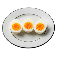 Three halved boiled eggs on plate, isolated on transparent background