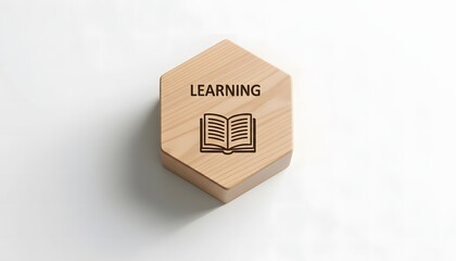 Fototapeta premium Learning Concept with Wooden Hexagon Block and Open Book Icon on White Background