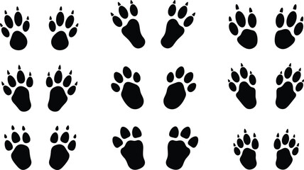 Collection of Wild Animal Paw Prints and Wildlife Tracks Silhouette Icons Isolated on White Background for Nature Tracking Forest Exploration and Education Graphic Design © Tanzila