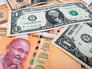 currency exchange concept with indian rupee and us dollar bank notes