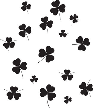Scattered black clover leaves on a white background