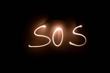 Text SOS, made with light.