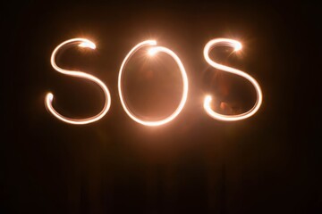 Text SOS, made with light.