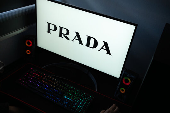 Punta Arenas, Chile &ndash; January 20, 2026: Iconic Prada Milano triangle logo and wordmark displayed on a professional computer monitor