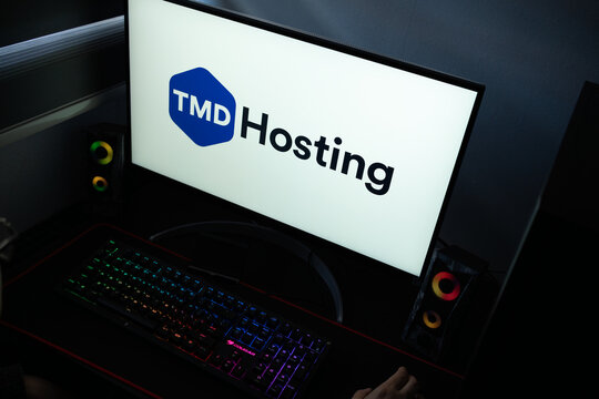 Punta Arenas, Chile &ndash; January 20, 2026: Iconic white and blue TMDHosting wordmark logo displayed on a professional computer monitor
