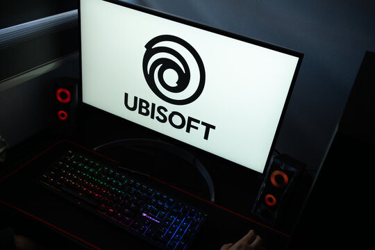 Punta Arenas, Chile &ndash; January 20, 2026: A desktop monitor featuring the stylized Ubisoft logo alongside glowing computer peripherals and RGB lighting