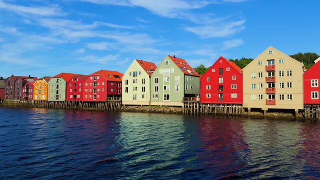Trondheim historic colorful wharf houses on Nidelva river sumer Norway