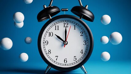 A close-up shot of a classic black analog alarm clock with its white face and black numbers, vividly contrasting against a striking blue backdrop. White spheres are suspended in the air around the