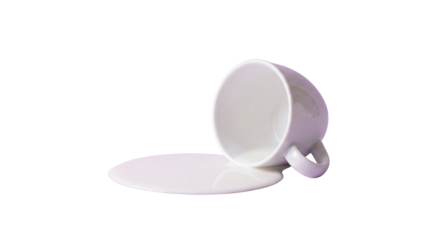 A spilled white ceramic coffee mug lies sideways with liquid pooling beneath it on transparent background